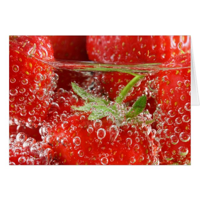 Strawberries in water close up (Front Horizontal)