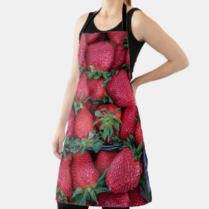 Strawberries with green leaves apron
