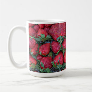 Strawberries with green leaves coffee mug
