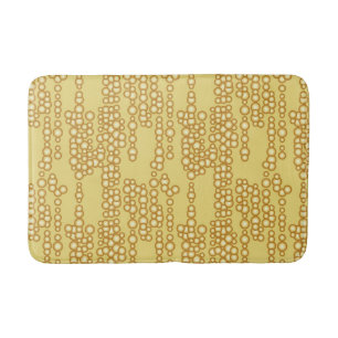 Stream of golden bubbles bath mat