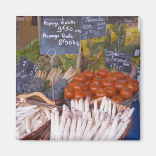 Street market merchant's stall with white magnet