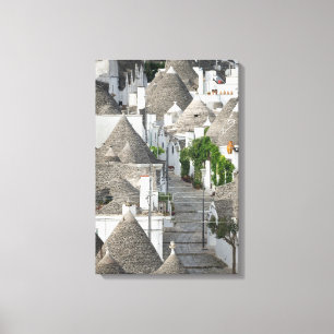 Street with trulli houses in Alberobello, Puglia Canvas Print