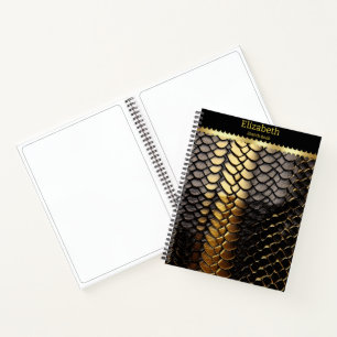 Striking black and gold pattern of a snake's skin notebook