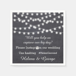 String of lights on chalkboard & hashtag wedding napkin