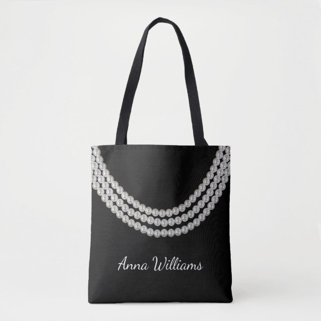 string of white pearls on black tote bag (Front)