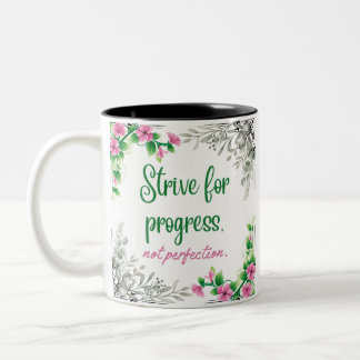 Strive for progress, not perfection. Two-Tone coffee mug