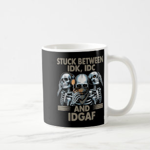 Stuck Between Idk, I And Idgaf, Funny Skeleton Gan Coffee Mug