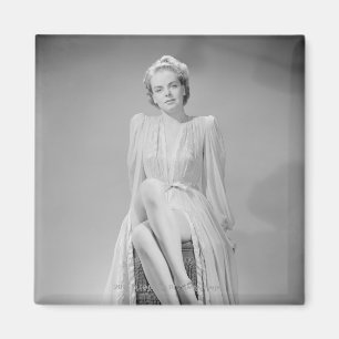 Studio portrait of young woman in nightgown magnet