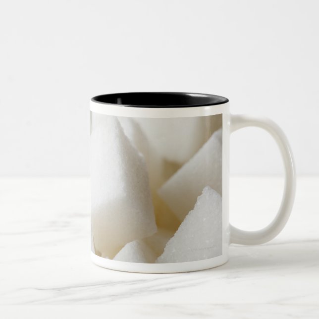 Studio shot of sugar cubes in bowl Two-Tone coffee mug (Right)