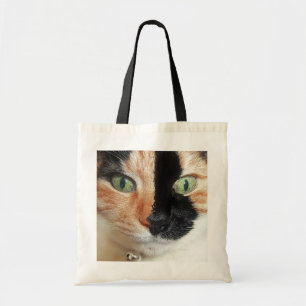 Stunning Tortoiseshell Cat with Vivid Green Eyes Tote Bag
