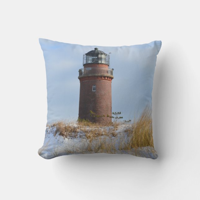 Sturdy Lighthouse on a Rocky Coast in Winter Cushion (Front)
