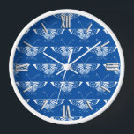 Stylised Art Deco butterfly, cobalt blue and white Wall Clock<br><div class="desc">Reproduction of a stylised Art Deco butterfly wallpaper pattern - White butterflies on a deep cobalt blue background</div>