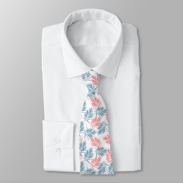 Stylised  blue and coral red leaves pattern tie (Tied)