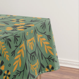 Stylised botanical orange and black floral pattern tablecloth