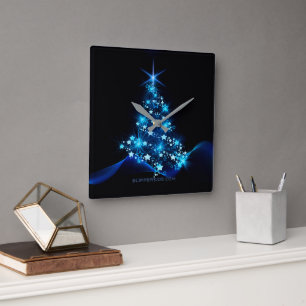 stylised Christmas tree SlipperyJoe glowing blue s Square Wall Clock