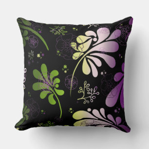 Stylised colourful leaves and flowers on black  cushion