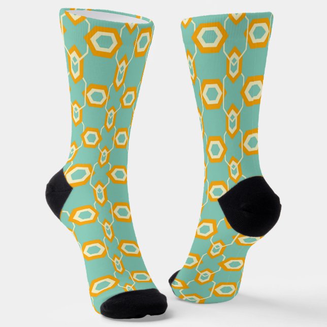 Stylised geometric pattern in bold orange hexagon socks (Angled)