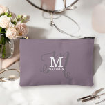 Stylish Monogram and Name Calligraphy Purple Accessory Pouch<br><div class="desc">A beautiful accessory pouch to use as a cosmetic bag or other purpose, this design has a stylish and elegant representation of your name and monogram with classic serifs and a more ornate script calligraphy in a balanced and beautiful layout. The three elements blend together with a sophisticated harmony and...</div>