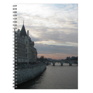 Stylish Notebook with beautiful sunset in Paris