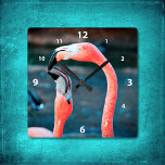 Stylish pink flamingo best friends photo modern square wall clock<br><div class="desc">Who says flamingos can’t have fun with their favourite pal? Enliven up your favourite room with this stunning, colourful photography wall clock of two flamingos playing around. Your choice of a round or square clock face. Makes a great housewarming gift! You can easily personalise this wall clock plus I also...</div>