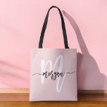 Stylish Pink Modern Script Girly Monogram Name Tote Bag<br><div class="desc">The Stylish Pink Modern Script Girly Monogram Name Tote Bag is the perfect blend of fashion and function. Featuring a soft pink background and a personalised monogram in a modern script font, this tote bag adds a chic, personalised touch to your everyday style. Crafted from durable, high-quality materials, it's spacious...</div>