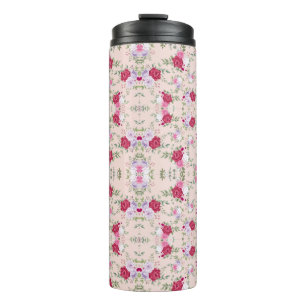 Stylish red and purple floral print on blush pink thermal tumbler