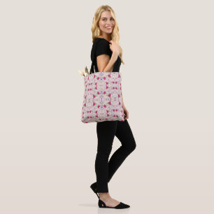 Stylish red and purple floral print on blush pink tote bag