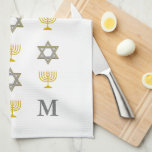 Stylish Star of David Menorah Jewish Monogram Tea Towel<br><div class="desc">Stylish, monogrammed Jewish-themed kitchen towel, showing faux gold and silver STAR OF DAVID and MENORAH in a tiled pattern against a white background. The bottom right hand corner has a CUSTOMIZABLE MONOGRAM so you can add your own initial. Ideal for Hanukkah and other Jewish-themed home decor. Choose from a wide...</div>