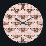 Stylized Art Deco butterfly - chocolate and peach Large Clock<br><div class="desc">Reproduction of a stylized Art Deco butterfly wallpaper pattern - Dark chocolate brown on a soft peach pink background</div>