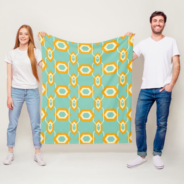 Stylized geometric pattern in bold orange hexagon fleece blanket (In Situ)