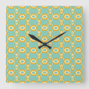 Stylized geometric pattern in bold orange hexagon square wall clock