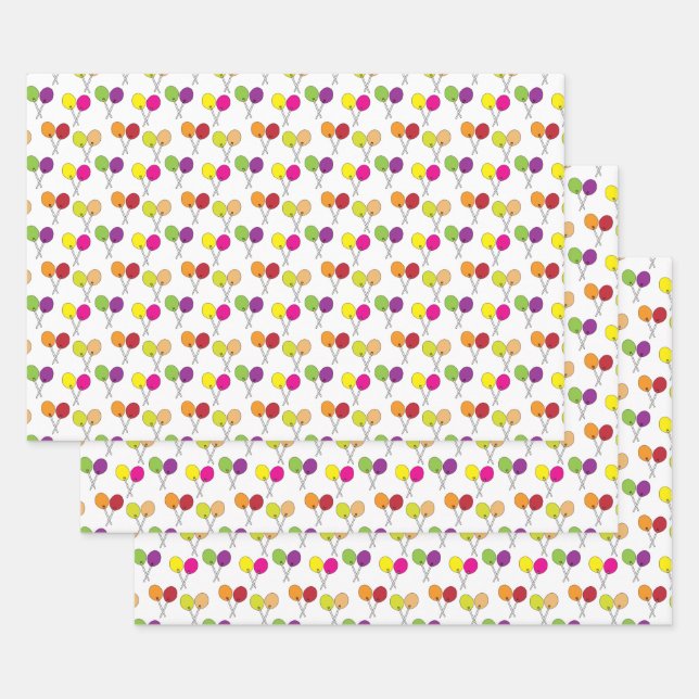 Suckers lollipops in green, purple, pink, yellow wrapping paper sheet (Set)