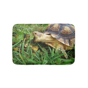 Sulcata Tortoise Taking Big Bite of Dandelion Leaf Bath Mat