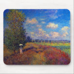 Summer art impressionist poppy fields by Monet Mouse Mat<br><div class="desc">This piece is titled: Poppy Field in Summer
 
A beautiful colourful French Impressionist landscape painting.
 
Claude Monet was a gifted painter with a long and prolific career.  He was a founding father of French impressionist painting.  The movement takes its name from the Monet painting titled:  Impression,  Sunrise.</div>