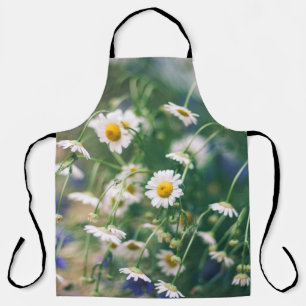 Summer flower pattern in green meadow with blue an apron
