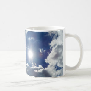 sun and clouds coffee mug