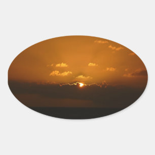 Sun Behind Clouds I Orange Sunset Photo Oval Sticker