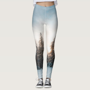 Sun behind spruce trees leggings