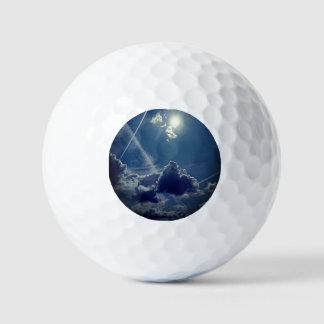 Sun behind the clouds golf balls