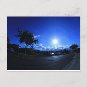 sun in the blue postcard