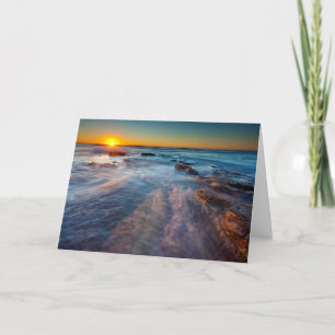 Sun rays illuminate the Pacific Ocean Card