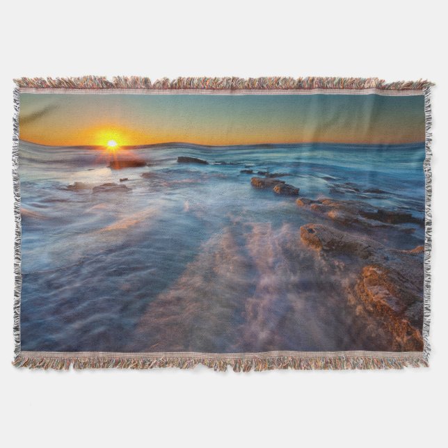 Sun rays illuminate the Pacific Ocean Throw Blanket (Front)