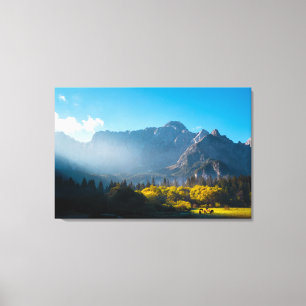 Sun rising on horses at lake Fusine, Italy Canvas Print