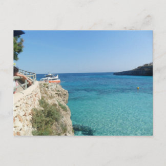 Sun, Sea and a little orange boat Postcard