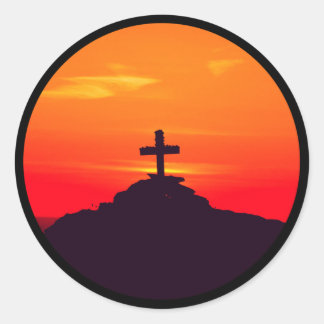 Sun setting on the cross, beautiful sunset classic round sticker