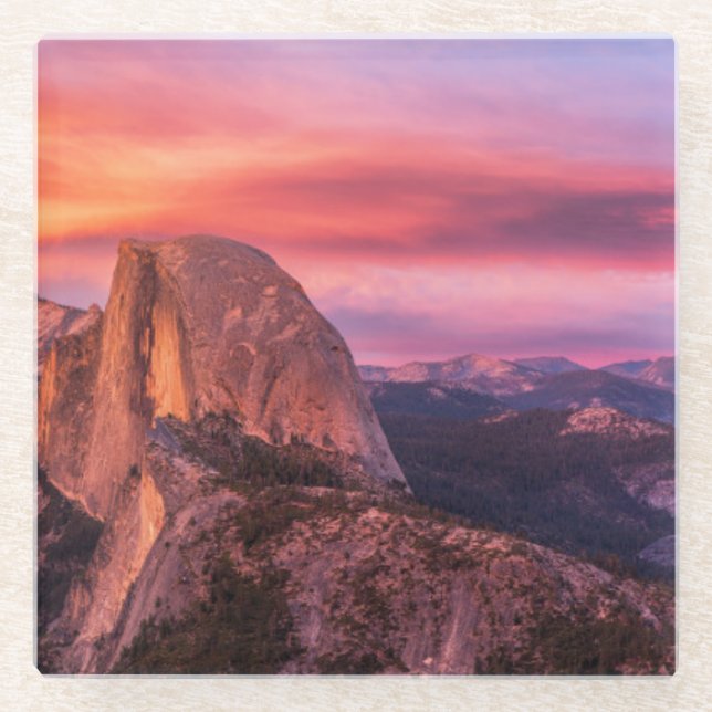 Sun Setting over A Rocky Landscape Glass Coaster (Front)