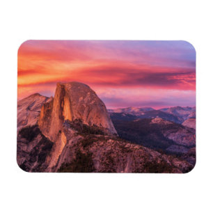 Sun Setting over A Rocky Landscape Magnet