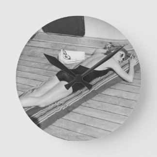 Sun Tanning Woman Round Clock