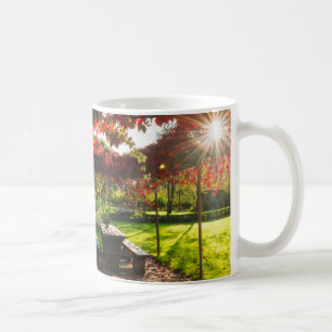 Sun through autumn leaves, Croatia Coffee Mug