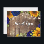 Sunflower & Navy Roses Rustic Thank You Card<br><div class="desc">Sunflower & Navy Roses Rustic Thank You Card. A great card where you can say thank you for anything,  wedding,  birthday and more!. Features yellow sunflowers with red roses and white baby's breath over a rustic wood background. Twinkle lights hang from the top with a heart.</div>